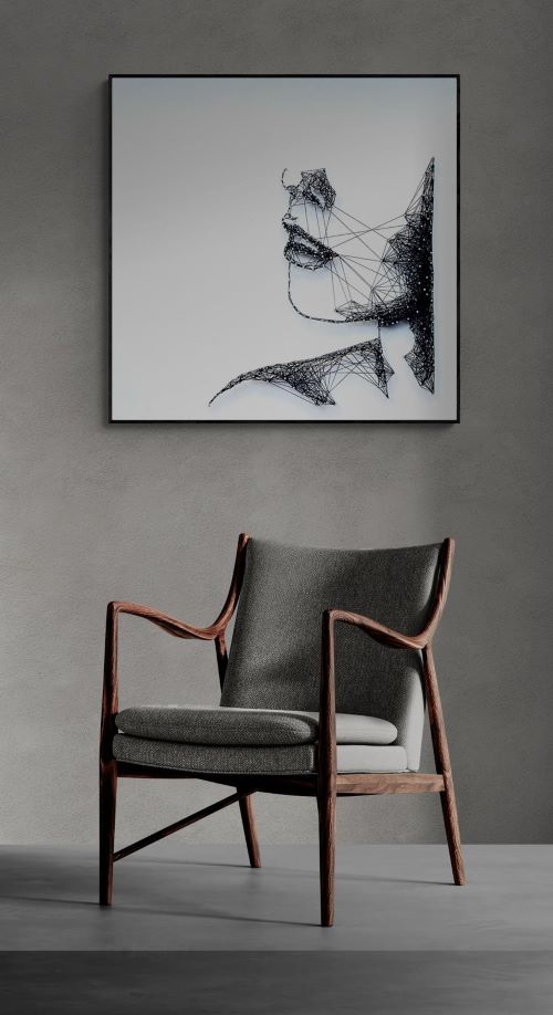 De Stilte van de Strijd, kunstwerk van spijkers en touw